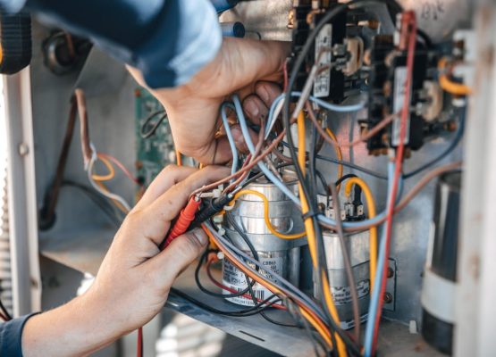 Home furnace system undergoing maintenance by a professional in Port Hope