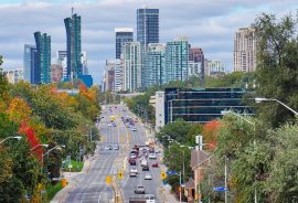 Professional installing a heat pump system in North York, ON