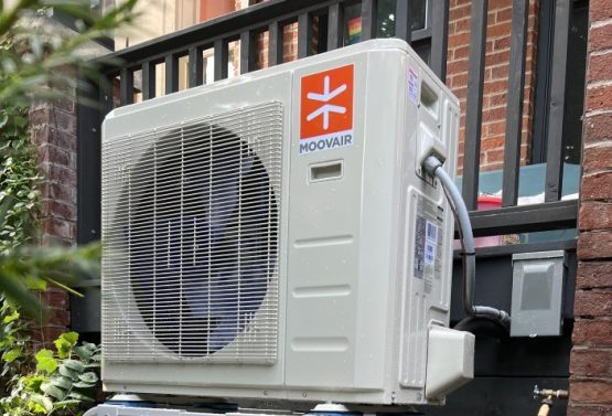 Heat pump installation tools and equipment in use at a Port Hope, ON property