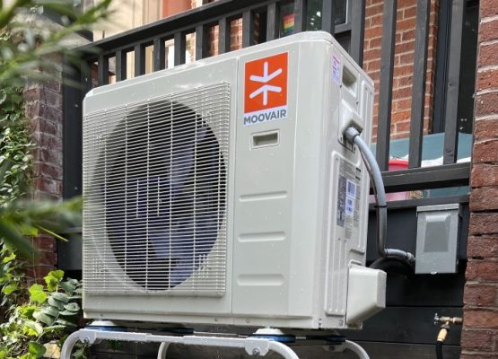 Heat pump installation tools and equipment in use at a Port Hope, ON property