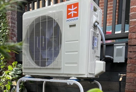 Heat pump installation tools and equipment in use at a Port Hope, ON property
